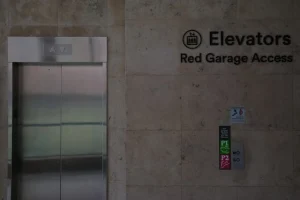 Elevator door retrofitting