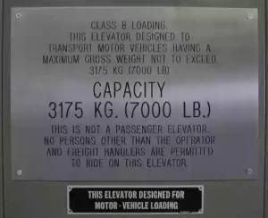 Elevator load limit sign