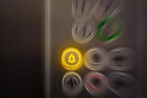 Elevator safety device-emergency call button
