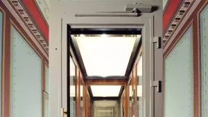 Modular elevator system being installed during a renovation project without damaging existing building structures.