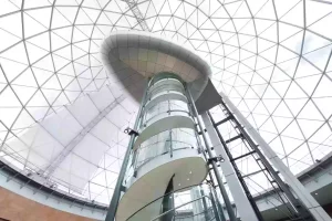 Traction elevators in high-rise buildings