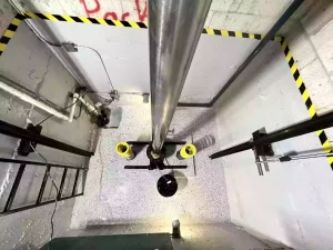 The picture shows a real shot of the elevator pit