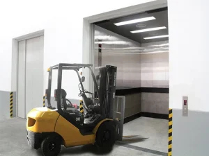 Service elevator with a load capacity of over two tons, designed to transport heavy goods and medical equipment in commercial and industrial settings